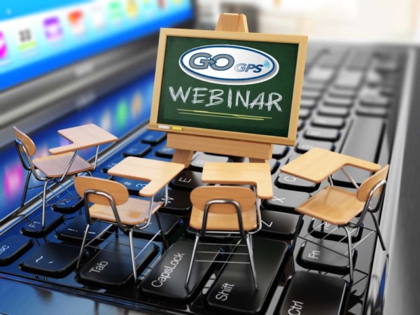 Webinar concept. Schooldesk and chalkboard on the laptop keyboar